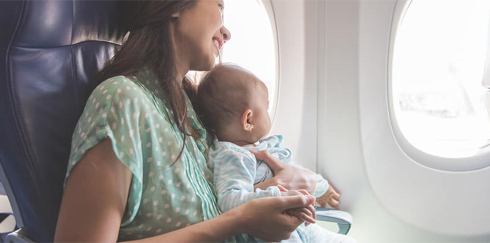 How to Travel with Babies. Essential tips for making travel with a baby on a plane.